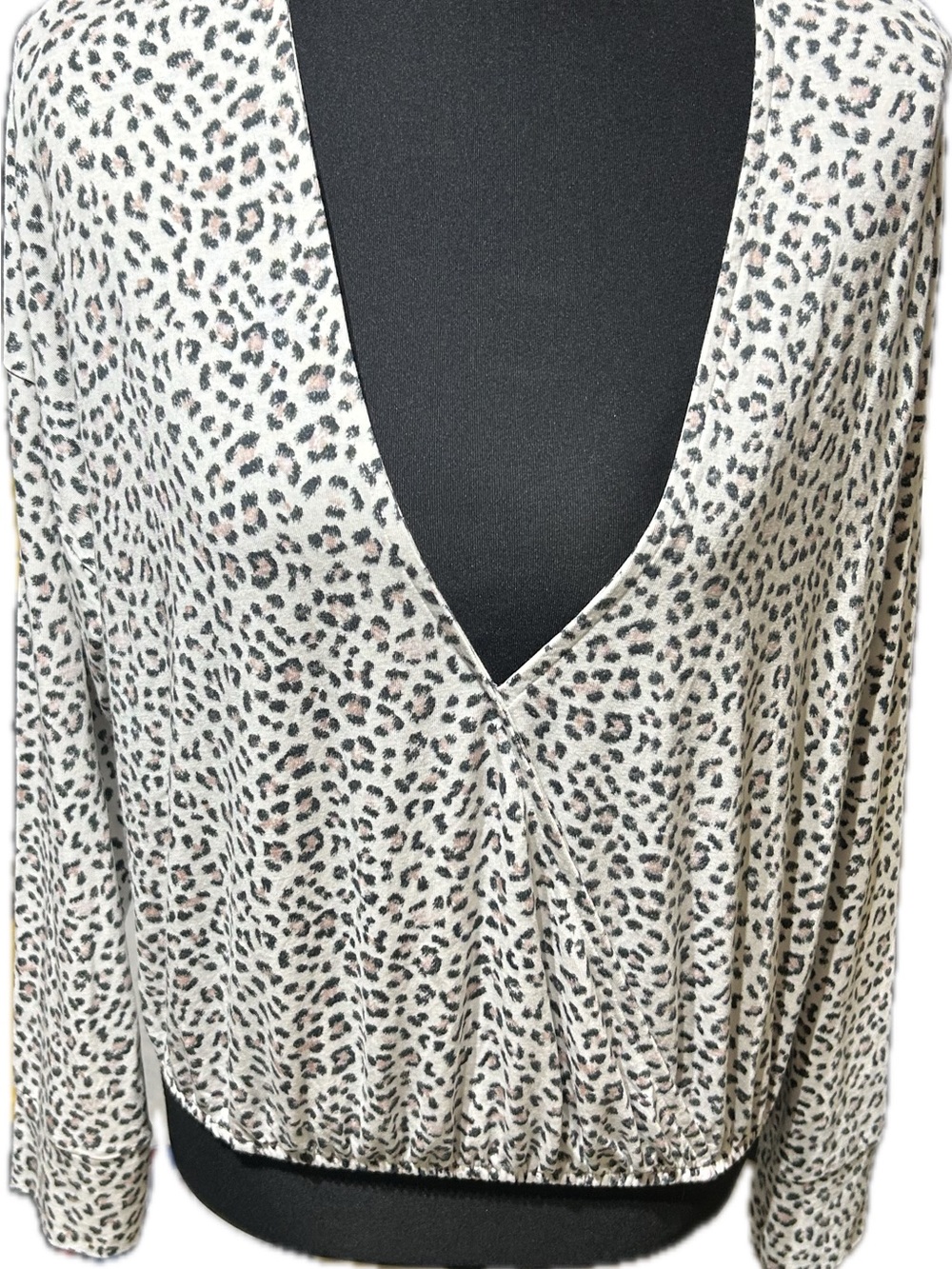 Victoria's Secret Light Cream and Gray Leopard V-Neck Top. Will fit up to large.
